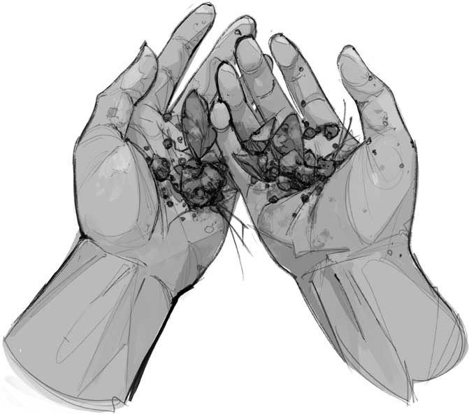 Dos manos sosteniendo piedras volcánicas.